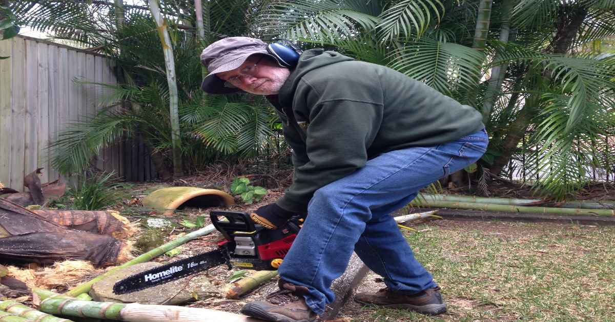 Man with Alzheimer's using a chain saw