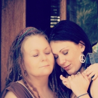 Mother and Daughter Embracing due to the emotional impact of Alzheimer's