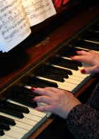 Lady playing a piano