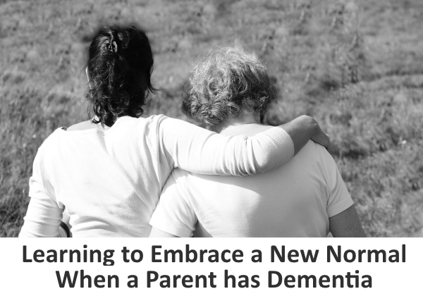 Daughter embracing mom who has dementia